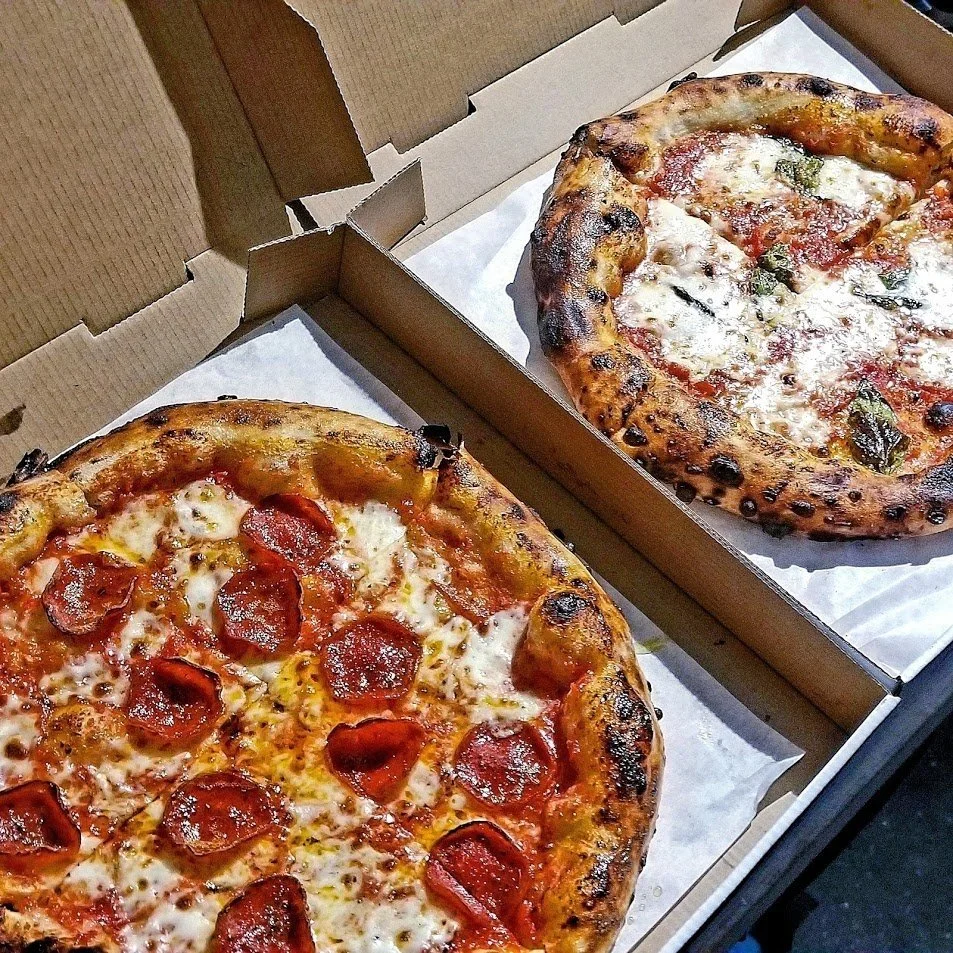 Serving pizza